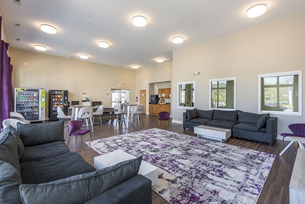 Clubhouse featuring modern leisure and game areas at Campus View Apartments