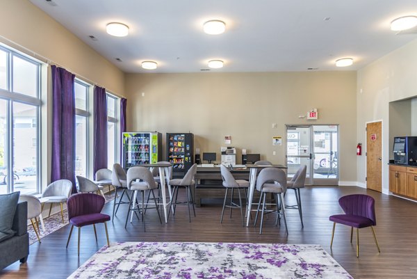 Modern clubhouse with stylish decor at Campus View Apartments, offering luxury amenities for residents