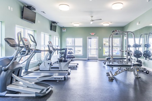 State-of-the-art fitness center with modern equipment at Campus View Apartments, offering a premium workout experience