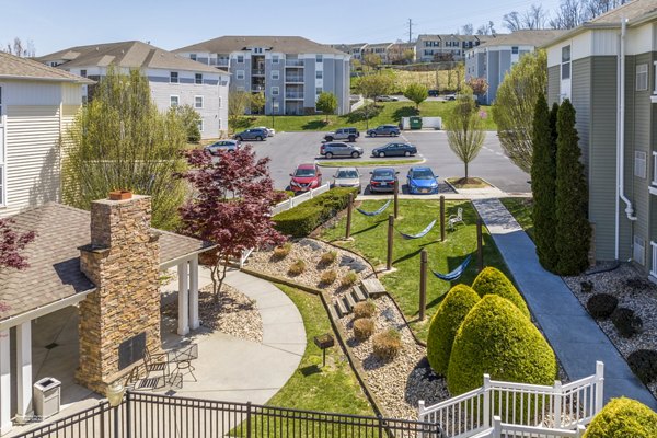 Relaxing patio with hammocks at Campus View Apartments, perfect for unwinding in a serene outdoor space