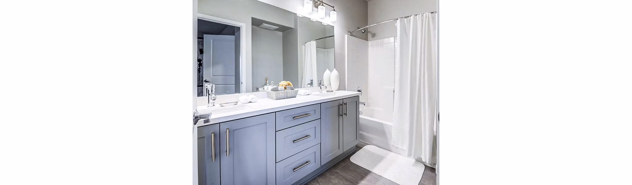 Modern bathroom with sleek fixtures at Sereno Apartments: Greystar luxury living experience