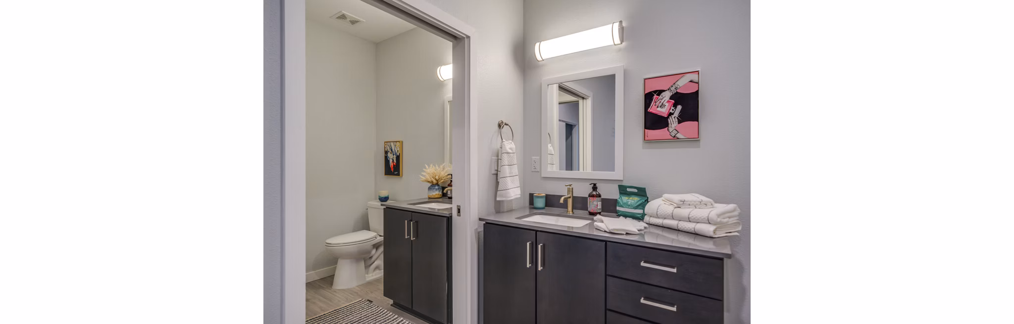 Modern bathroom featuring sleek fixtures and elegant tile work at FLATZ 602 Apartments, offering luxury living spaces