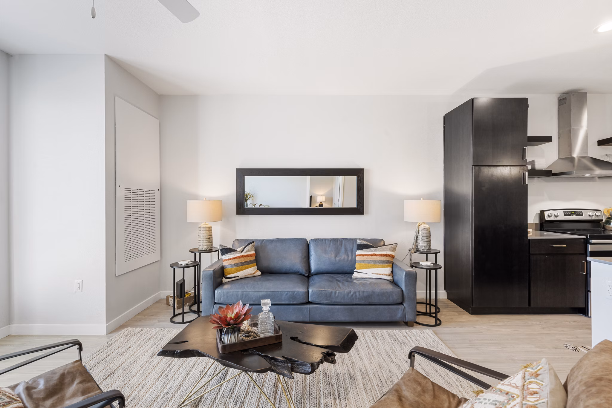 Modern living room with sleek furniture at FLATZ 602 Apartments, ideal for luxurious city living