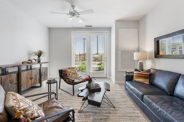 Contemporary living room with stylish furnishings at FLATZ 602 Apartments