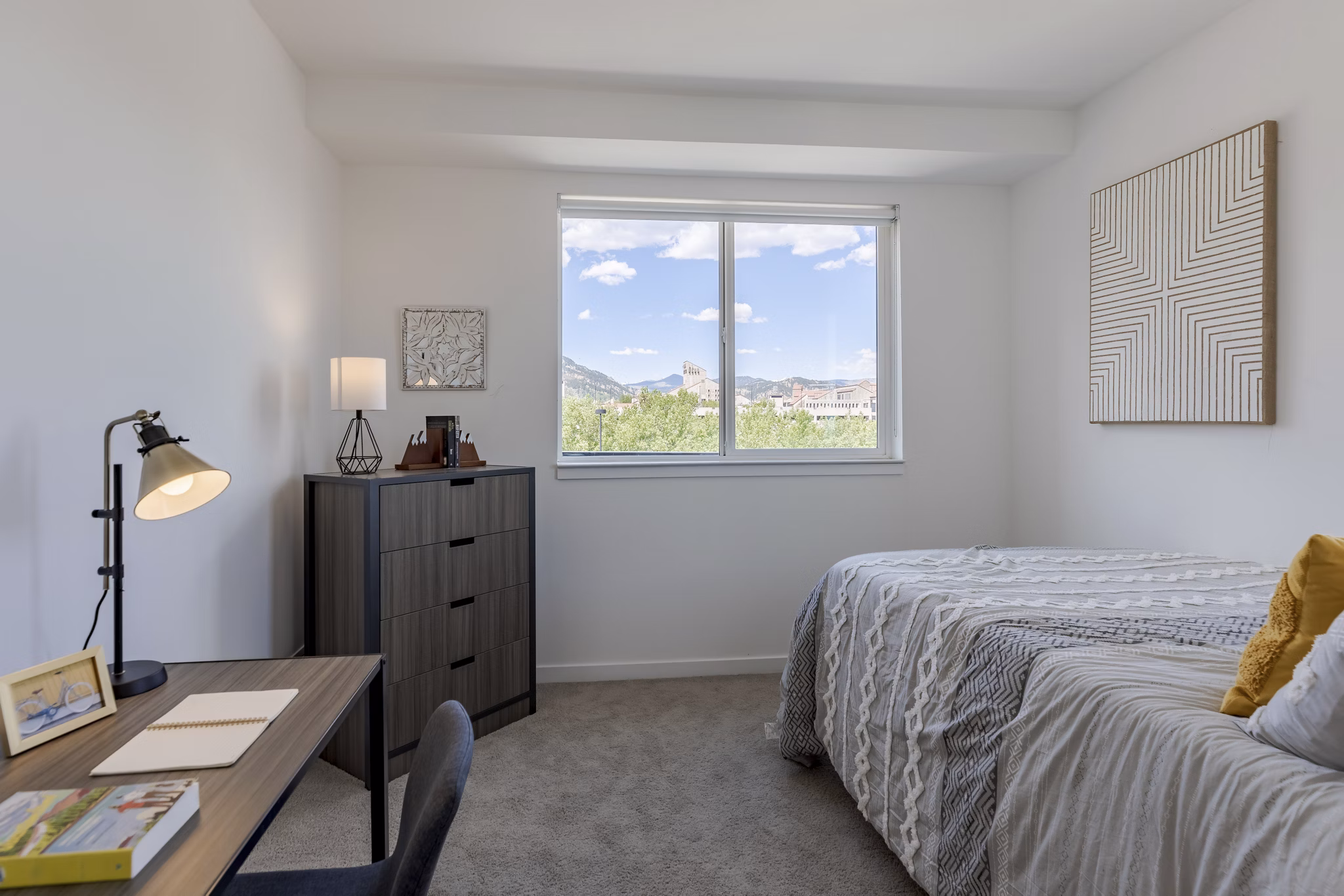 Spacious bedroom with modern furnishings at Union 9Seventy Apartments