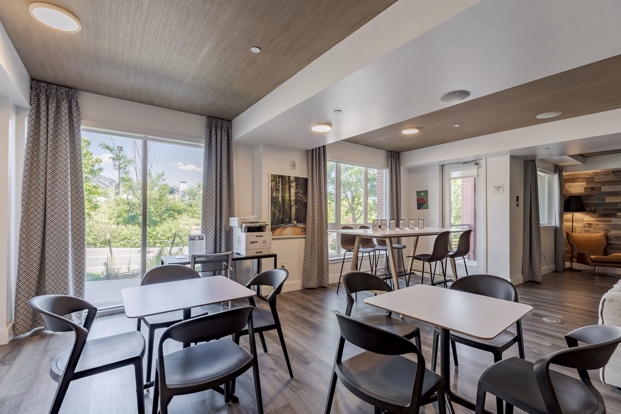 Modern clubhouse with cozy seating at Union 9Seventy Apartments