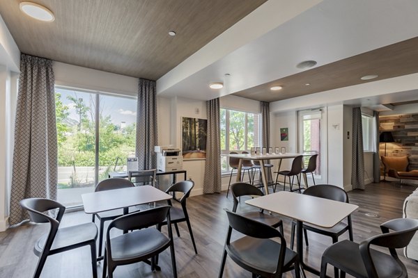 Modern clubhouse with cozy seating at Union 9Seventy Apartments