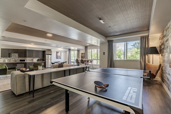 Union 9Seventy Apartments: Modern clubhouse with stylish decor and communal seating areas