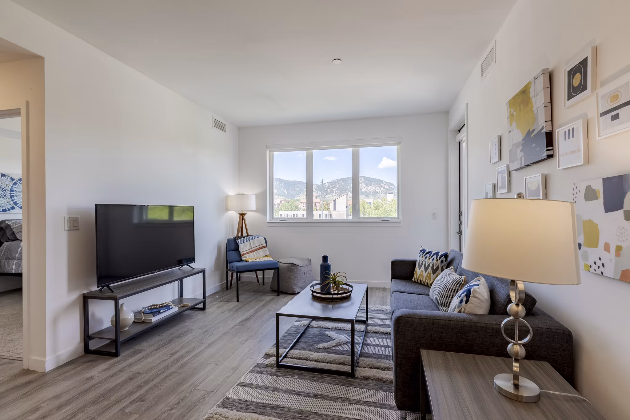 Spacious living room with modern furnishings at Union 9Seventy Apartments, featuring luxury design elements for premium living
