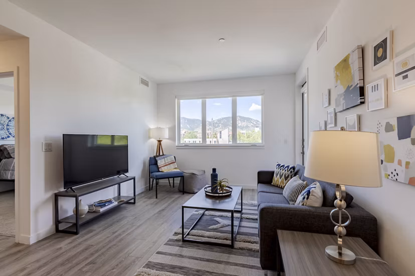 Spacious living room with modern furnishings at Union 9Seventy Apartments, featuring luxury design elements for premium living