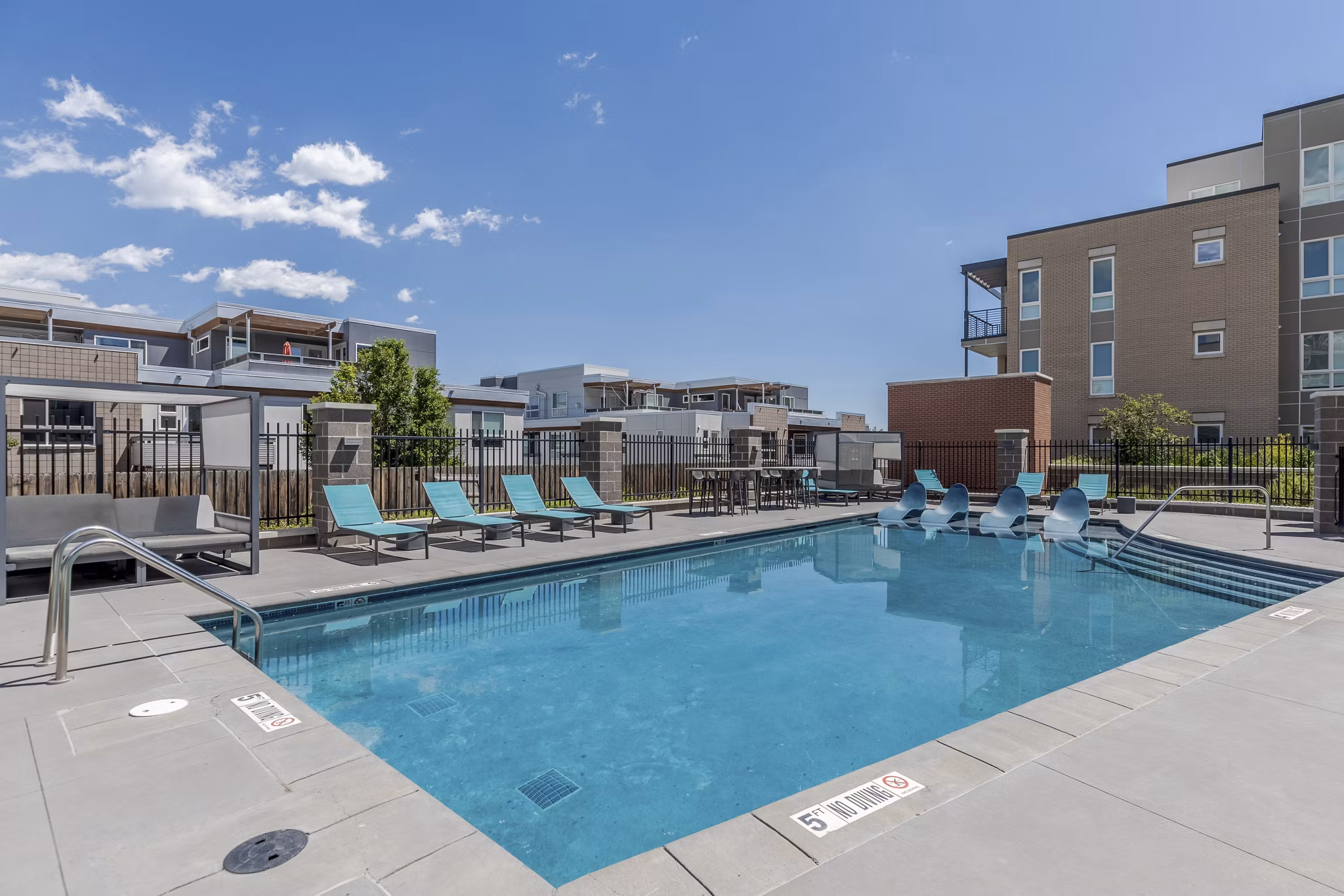 Inviting outdoor pool at Union 9Seventy Apartments perfect for leisure and relaxation