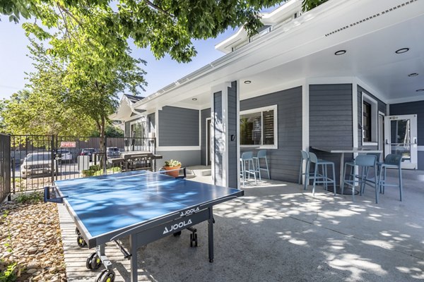 Chic outdoor patio with stylish seating at Union Baseline Apartments