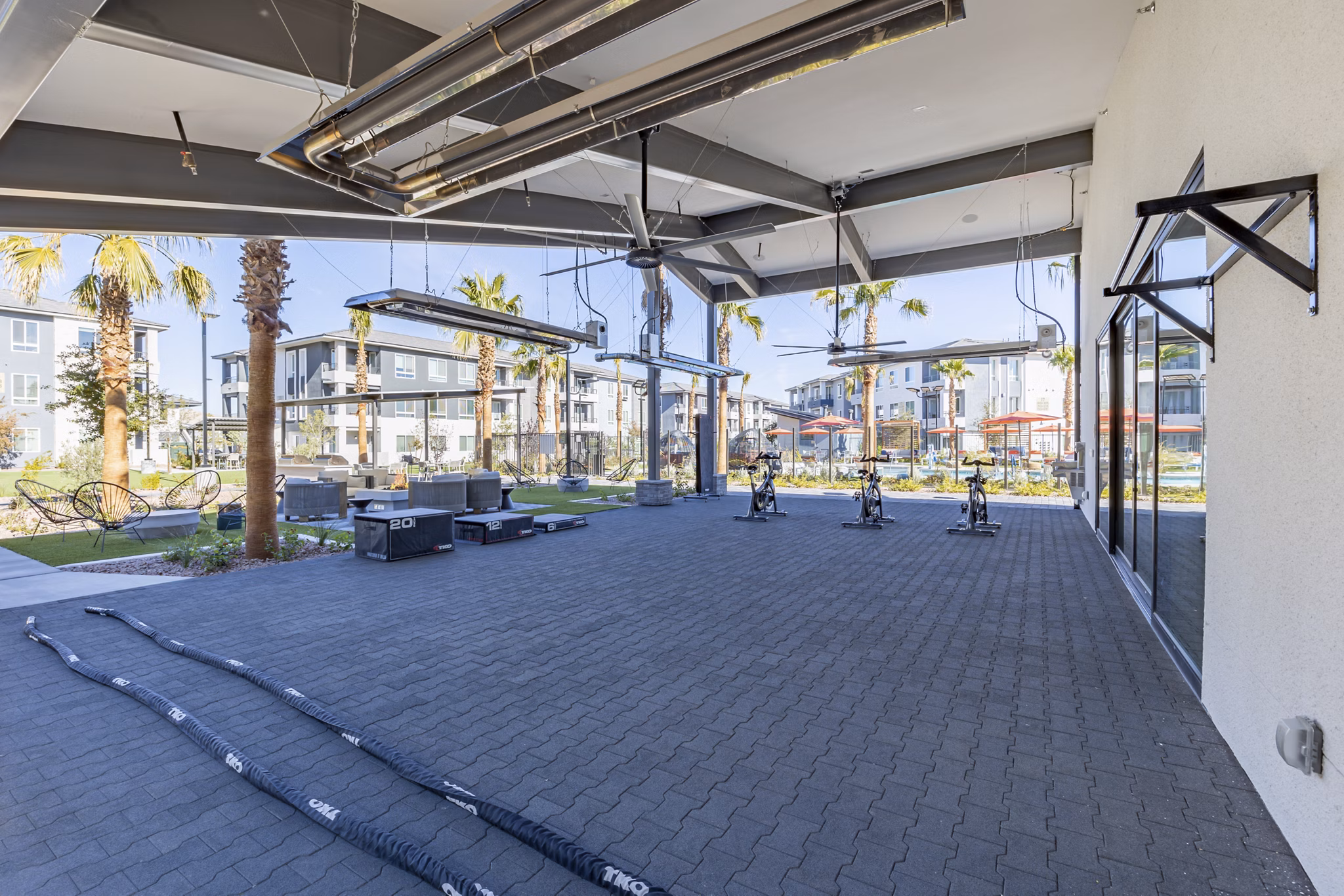 State-of-the-art fitness center featuring modern equipment at Alma Apartments