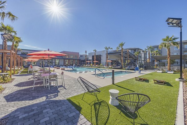 Luxury pool with cabanas at Alma Apartments, a premier community offering resort-style amenities