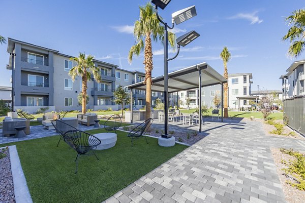 Courtyard with lush greenery at Alma Apartments, luxury living in a serene environment