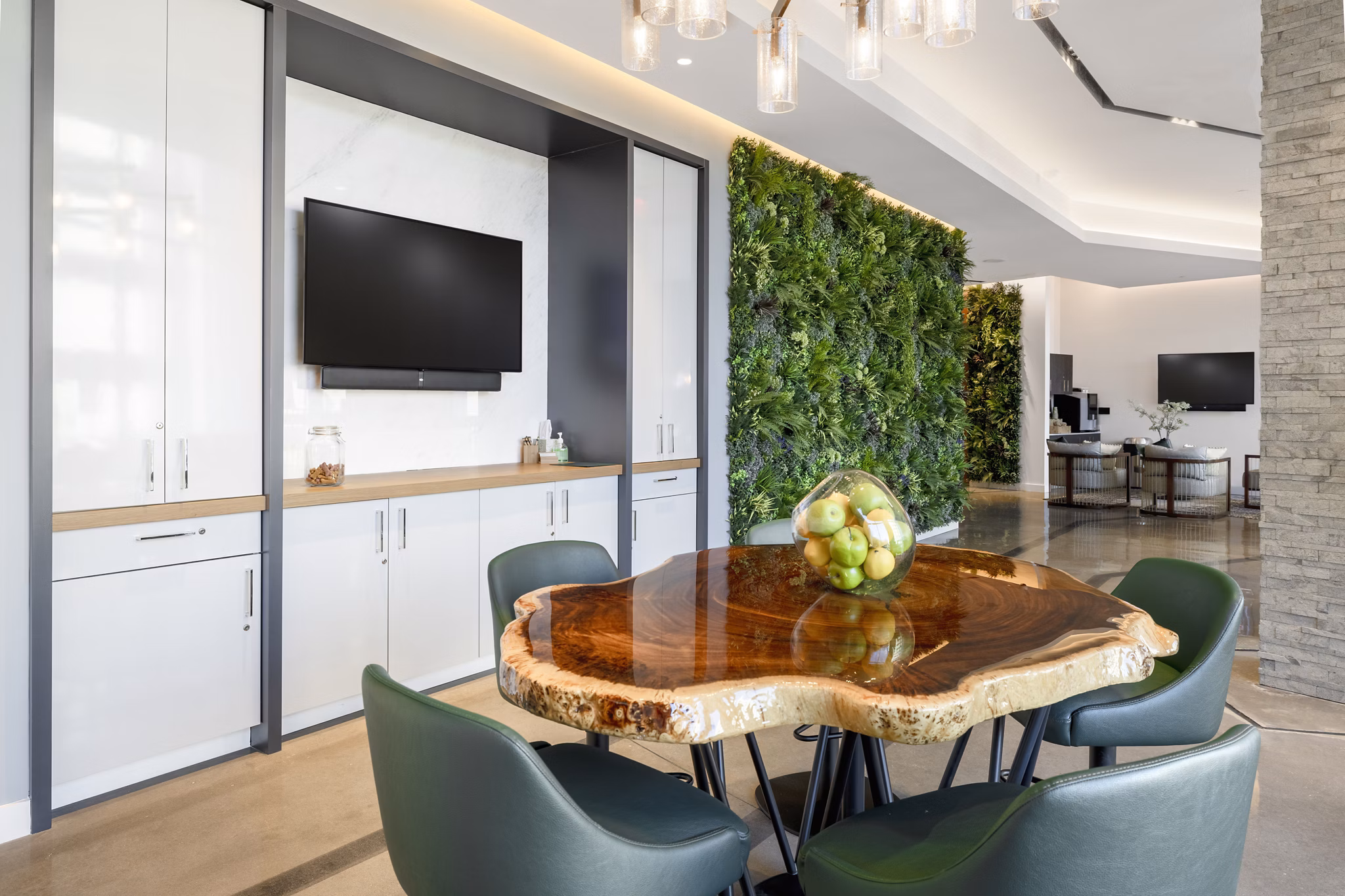 Luxury clubhouse with modern decor at The Cynwyd Apartments, ideal for social gatherings and resident events