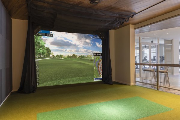 Modern clubhouse with cozy seating and entertainment options at The Cynwyd Apartments