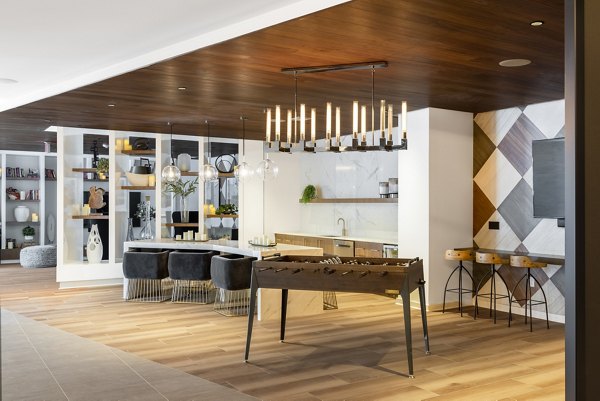The Cynwyd Apartments: Stylish clubhouse with modern decor and comfy seating areas