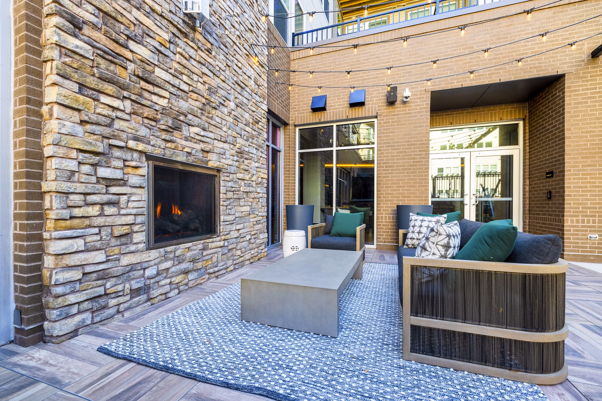 Inviting outdoor fire pit at The Cynwyd Apartments for cozy evenings and social gatherings