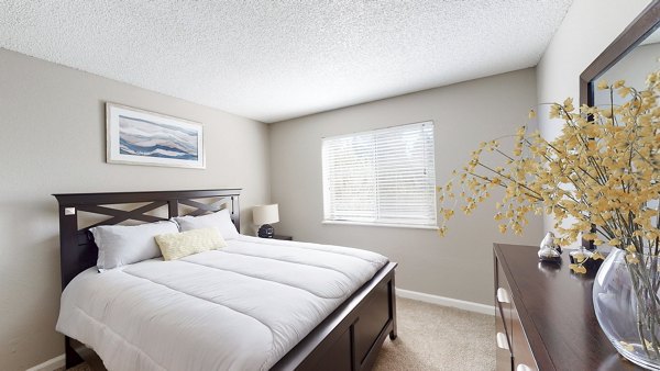 Stylish bedroom featuring modern design at Glen at the Park Apartments