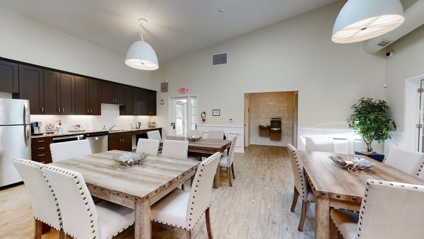 Clubhouse with luxurious seating and modern design at Glen at the Park Apartments, a Greystar luxury property