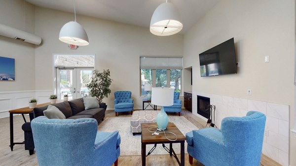 Modern clubhouse at Glen at the Park Apartments with luxury seating and decor, ideal for social gatherings and community events