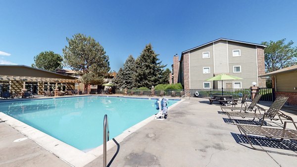 Sparkling outdoor pool at Glen at the Park Apartments, offering luxury amenities in Greystar community living