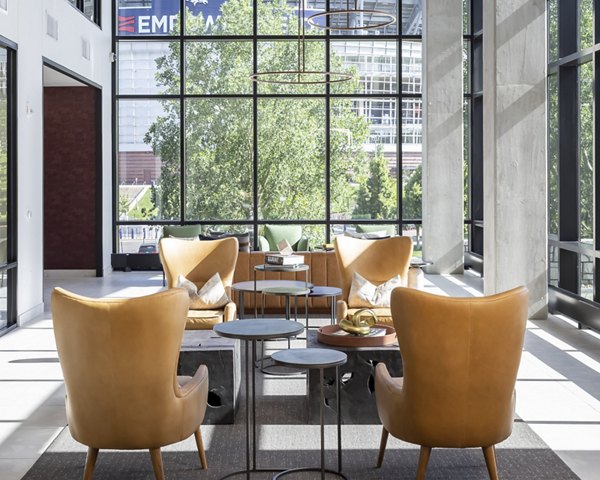 Clubhouse featuring stylish seating and modern design at 1919 Mile High Apartments