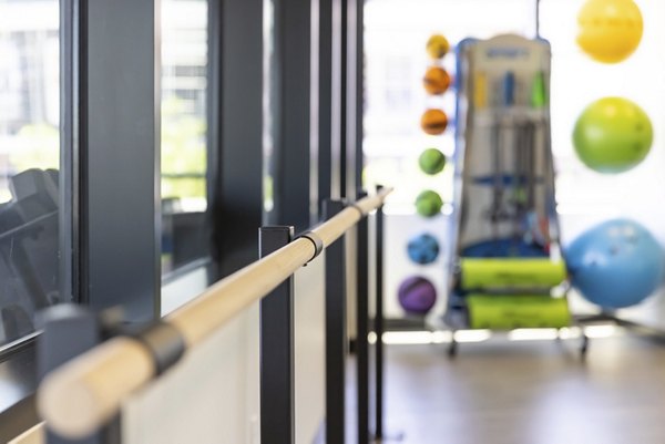 Modern fitness center with state-of-the-art equipment at 1919 Mile High Apartments