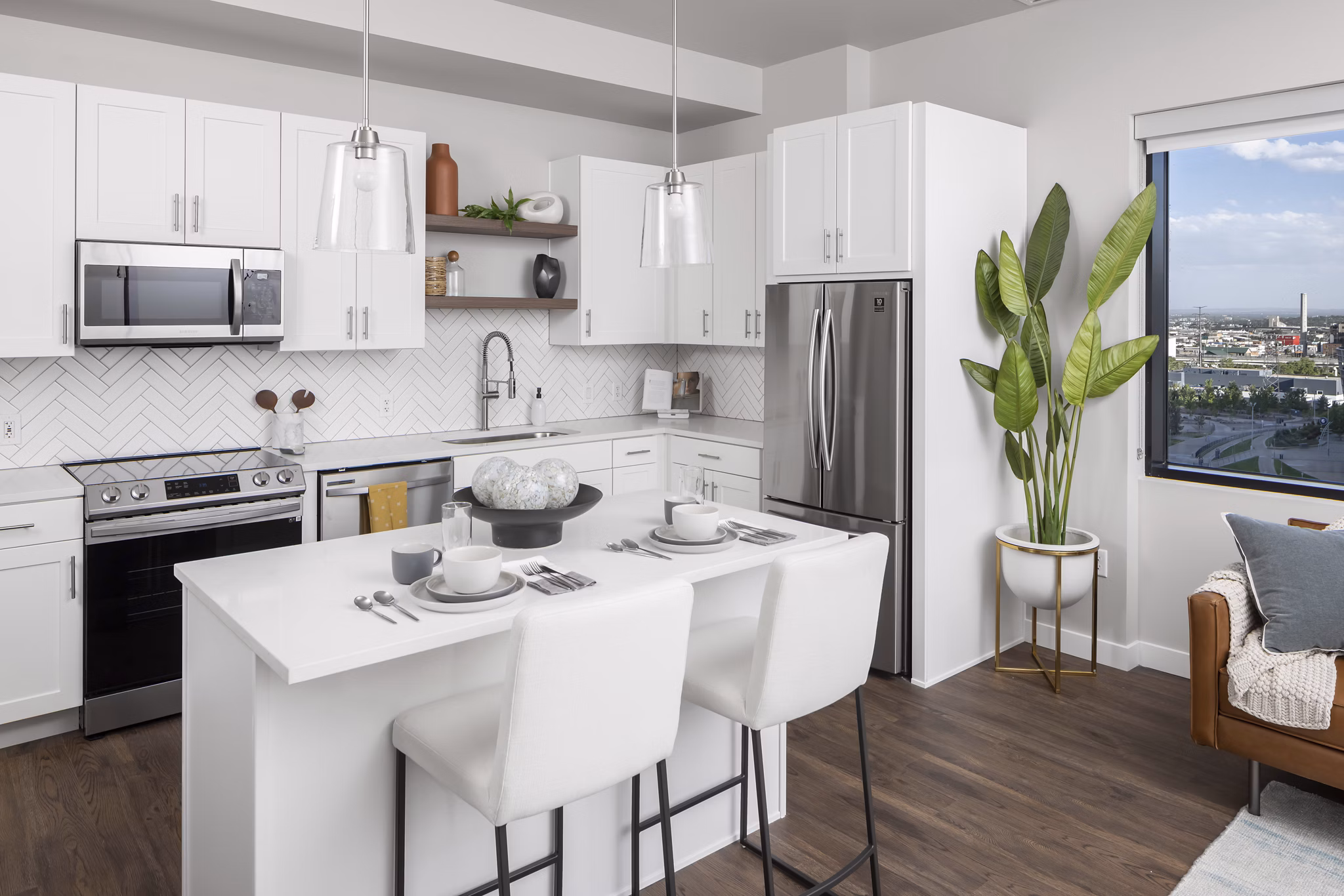 Stylish kitchen with modern appliances at 1919 Mile High Apartments