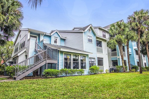 The Retreat at Vista Lake: Elegant building showcasing luxury apartments near lakeside