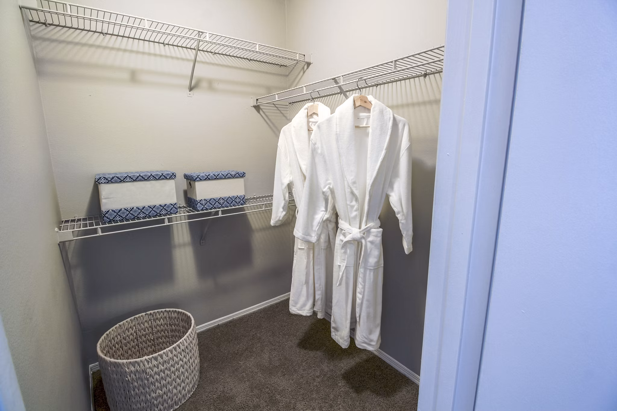 Walk-in bedroom closet with ample storage at The Retreat at Vista Lake Apartments