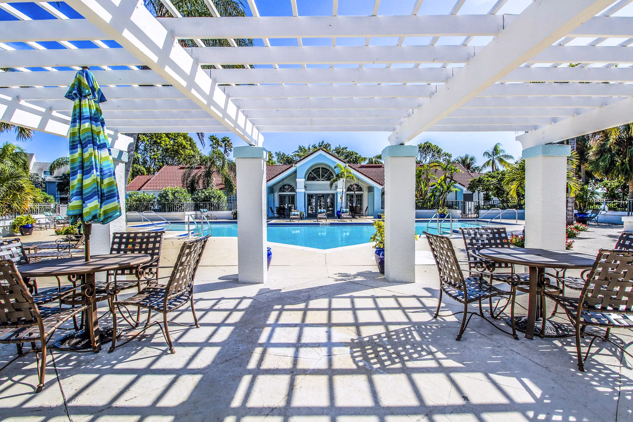 Serene pool and patio at The Retreat at Vista Lake Apartments offering luxury relaxation and outdoor leisure in a picturesque setting