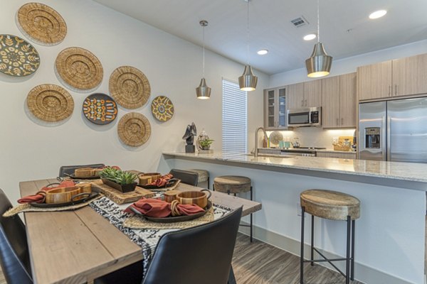 dining room at Alexan Riverside Apartments