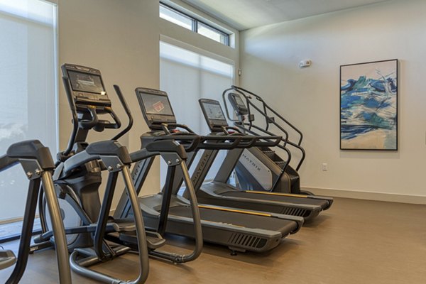 fitness center at Alexan Riverside Apartments