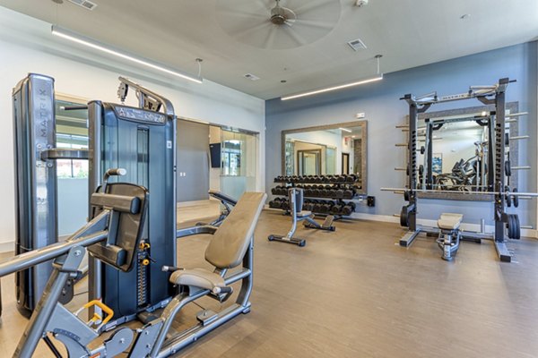 fitness center at Alexan Riverside Apartments