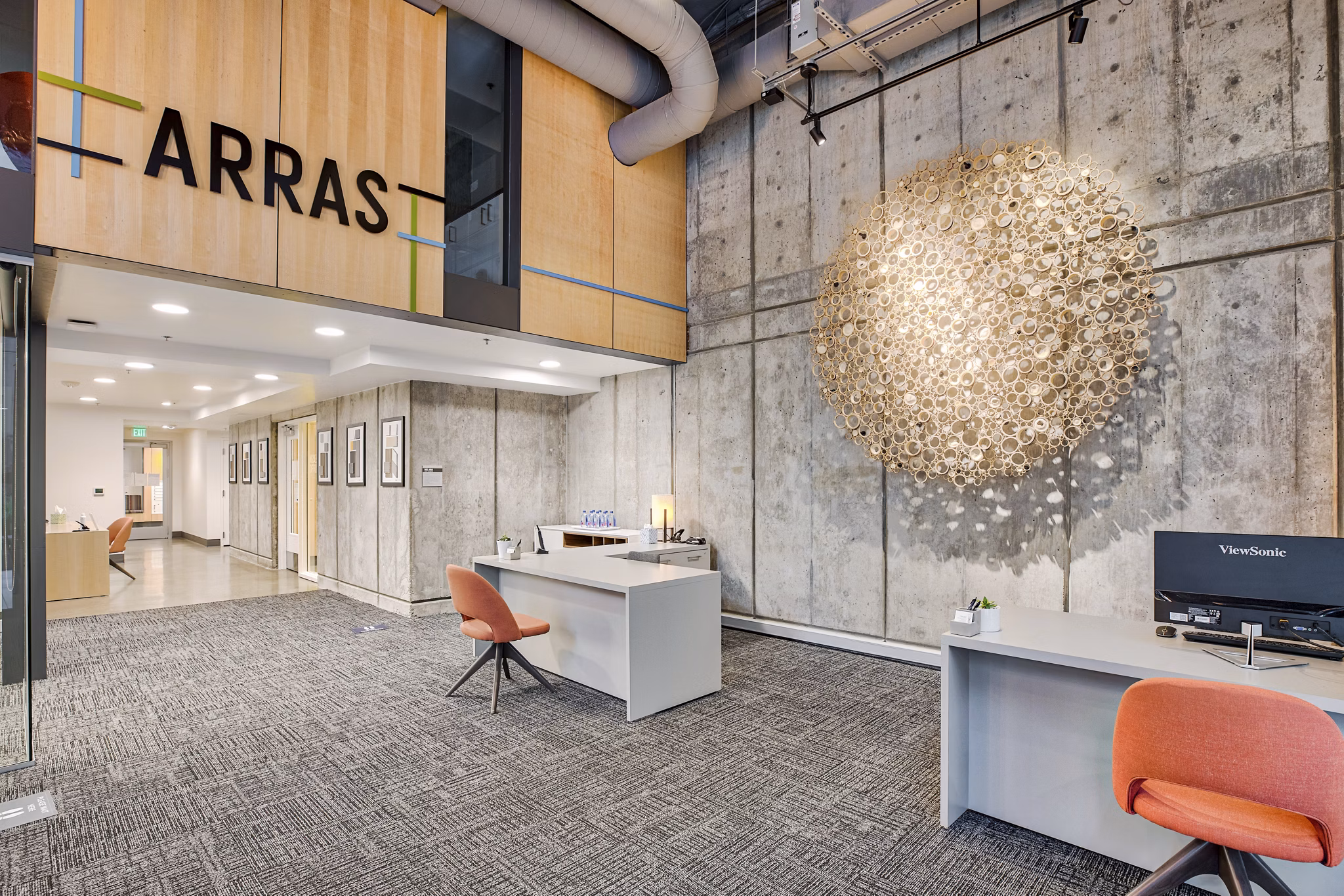 Clubhouse featuring modern seating and communal spaces at Arras Apartments, a luxury community offering exceptional amenities