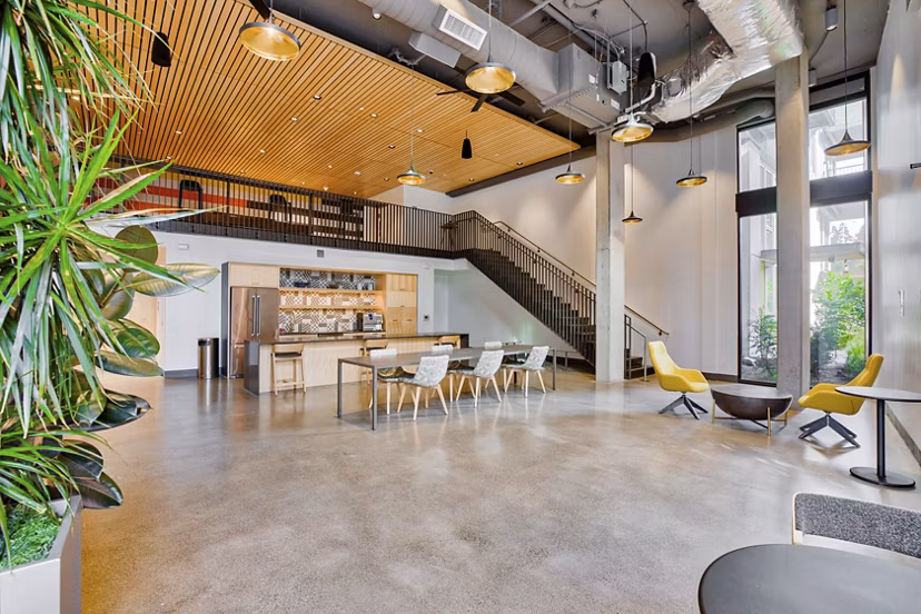 Clubhouse featuring modern design and comfortable seating at Arras Apartments