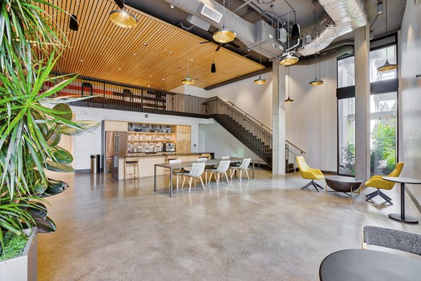 Clubhouse featuring modern design and comfortable seating at Arras Apartments