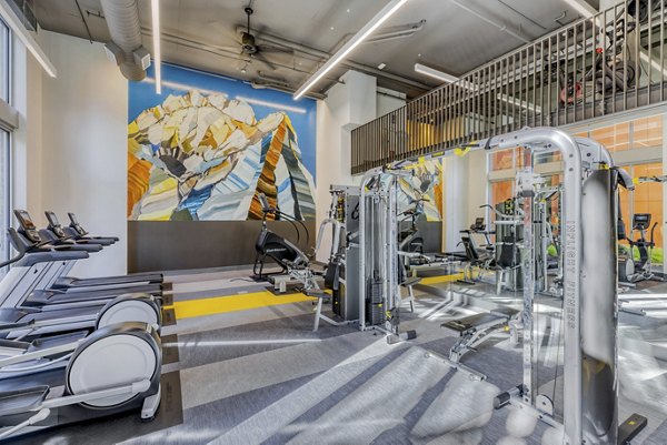 State-of-the-art fitness center with modern equipment at Arras Apartments