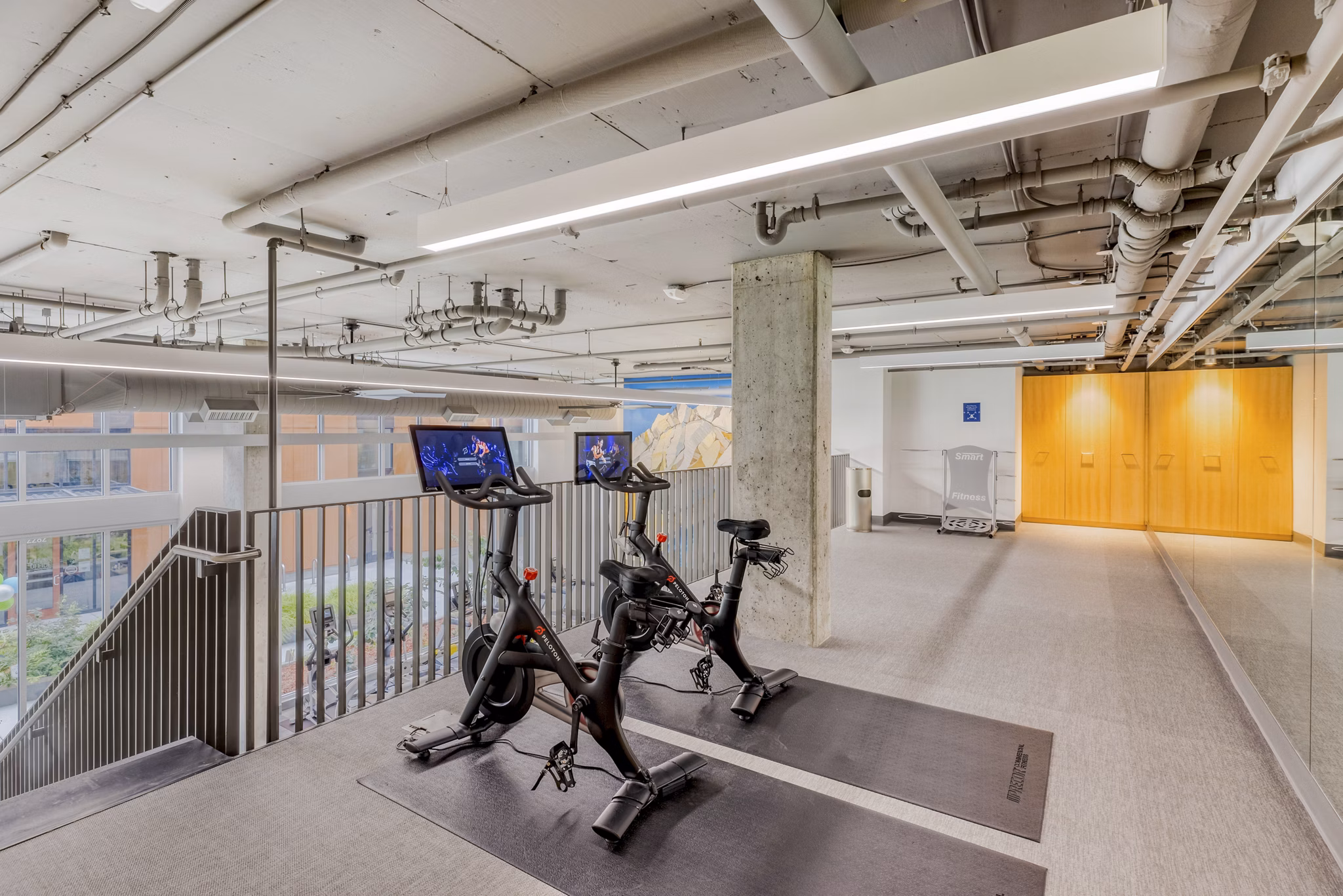 State-of-the-art fitness center with modern equipment at Arras Apartments, perfect for active lifestyles in a luxury setting
