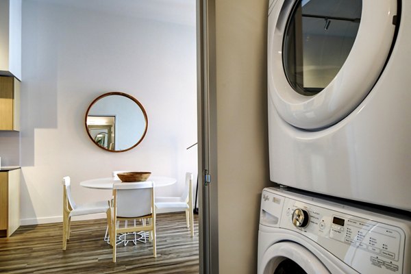 laundry room at Arras Apartments