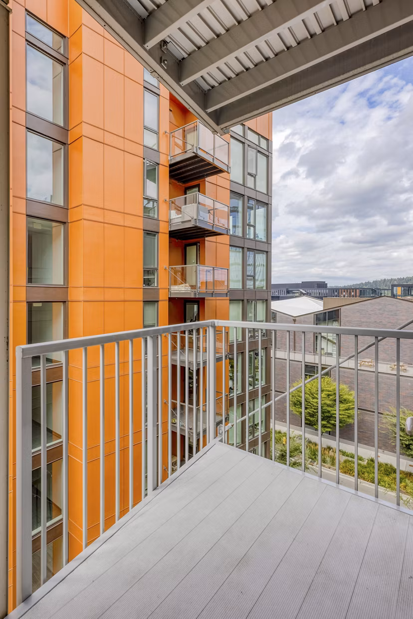 Chic patio with stylish seating at Arras Apartments, offering luxury outdoor living in a vibrant community setting