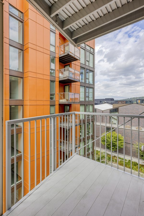 Chic patio with stylish seating at Arras Apartments, offering luxury outdoor living in a vibrant community setting