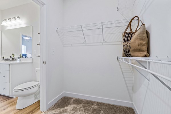 bedroom closet and bath at Queen City Towne Apartments Townhomes