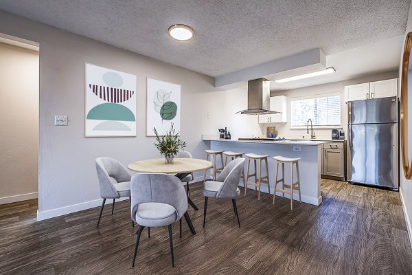 Elegant dining room with modern fixtures at 1202 Pearl Apartments, a luxury community