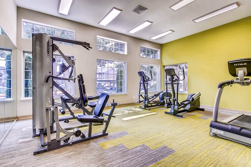 Fitness center with modern equipment at 1202 Pearl Apartments