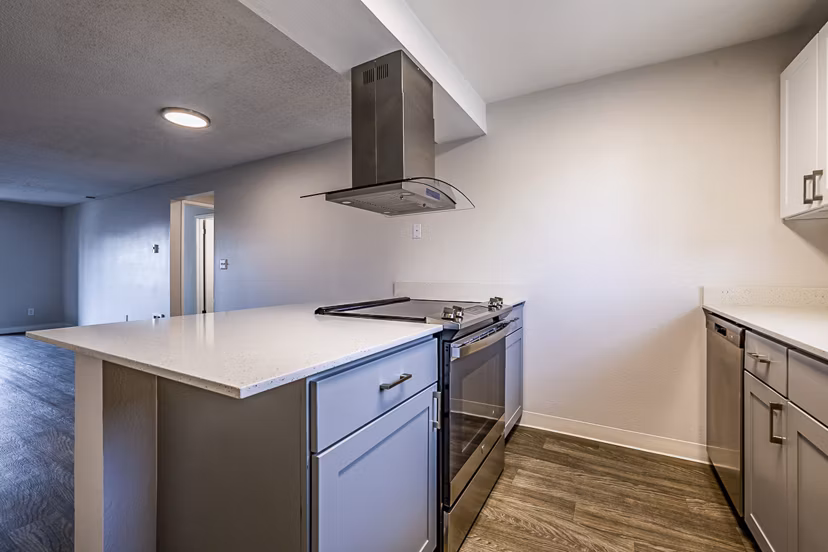 Modern kitchen with stainless steel appliances at 1202 Pearl Apartments in Greystar's elegant living community