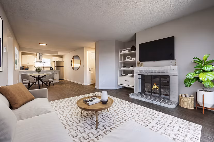 Modern living room with hardwood floors and contemporary decor at 1202 Pearl Apartments