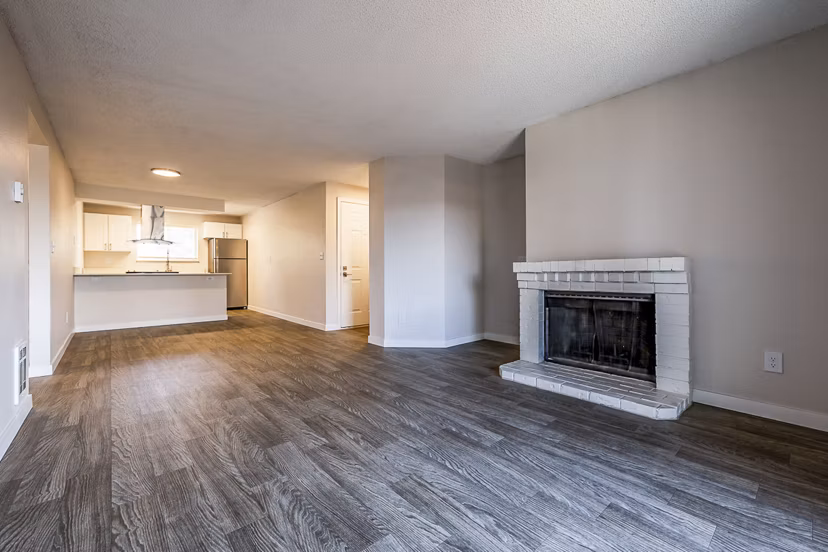 Spacious living room with modern decor in 1202 Pearl Apartments